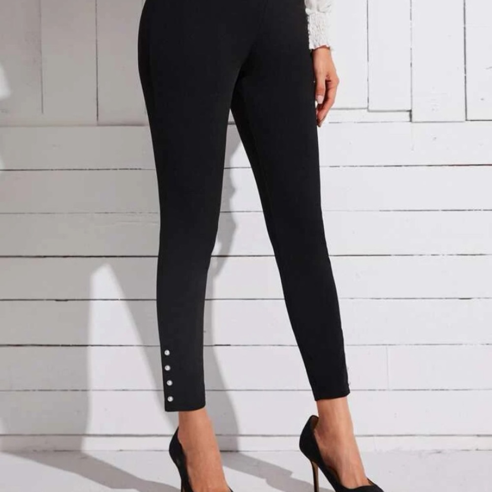 Black dress pants with pearl buttons